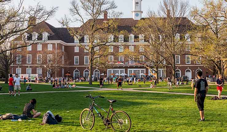 Urbana, Illinois, April 17, 2016 - Students are out on the Quad lawn of the University of Illinois college campus in Urbana Champaign